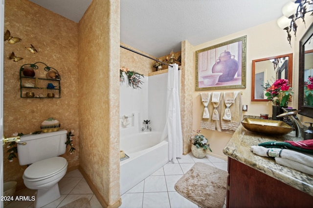 full bathroom with a textured ceiling, toilet, tile patterned floors, shower / tub combo with curtain, and vanity