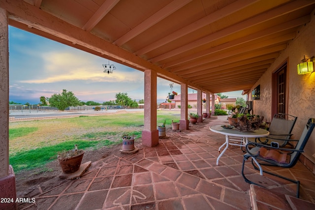 view of patio terrace at dusk