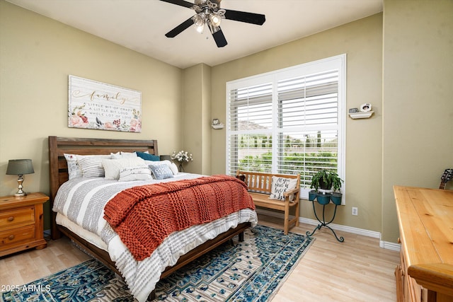 6326 W Misty Willow Ln, Glendale, AZ 85310 - bedroom featuring light wood-style flooring, baseboards, and ceiling fan