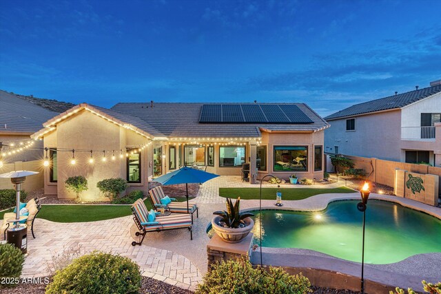 6326 W Misty Willow Ln, Glendale, AZ 85310 - view of swimming pool with a patio area and a fenced backyard