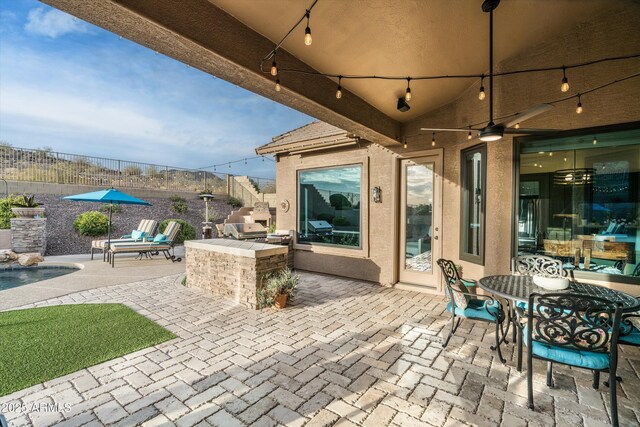 6326 W Misty Willow Ln, Glendale, AZ 85310 - view of patio / terrace featuring area for grilling, a ceiling fan, and outdoor dining space