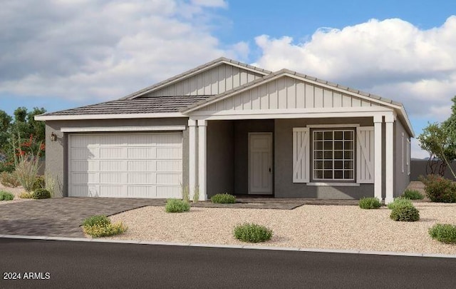 view of front of property featuring a garage