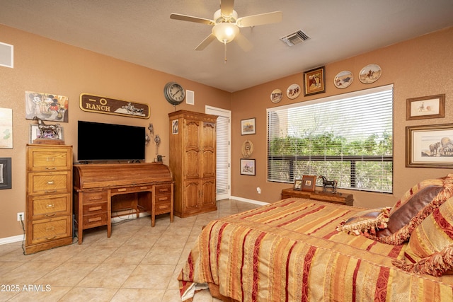 8698 E Preserve Way, Scottsdale, AZ 85266 - bedroom featuring light tile patterned floors and a ceiling fan
