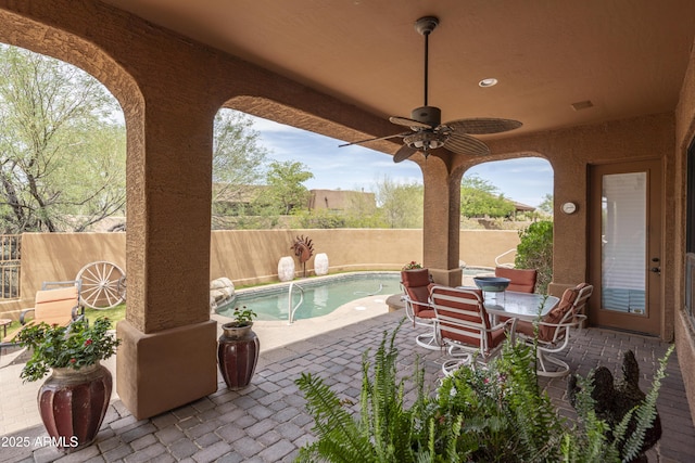 8698 E Preserve Way, Scottsdale, AZ 85266 - fenced backyard featuring a patio, a ceiling fan, and outdoor dining area