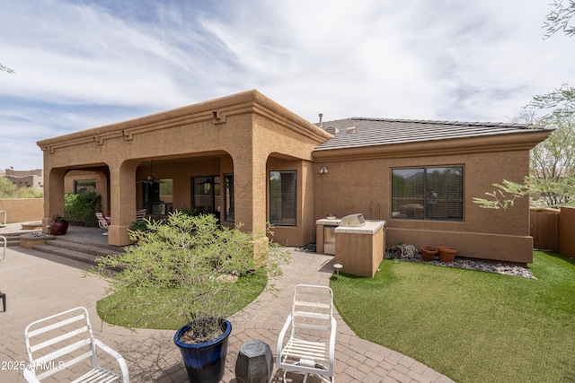 8698 E Preserve Way, Scottsdale, AZ 85266 - back of house with a patio, stucco siding, and a tile roof