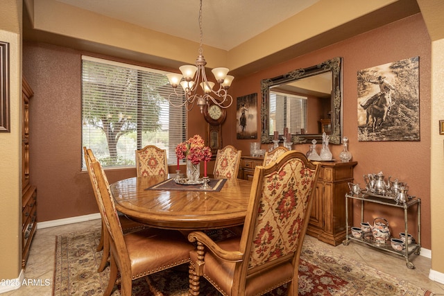 8698 E Preserve Way, Scottsdale, AZ 85266 - dining area with a chandelier, light tile patterned floors, and a textured wall