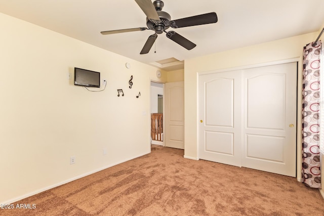 30013 N Candlewood Dr, San Tan Valley, AZ 85143 - unfurnished bedroom featuring a ceiling fan, baseboards, a closet, and light colored carpet