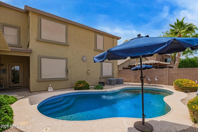 30013 N Candlewood Dr, San Tan Valley, AZ 85143 - view of pool with central AC, a patio area, a fenced in pool, and fence