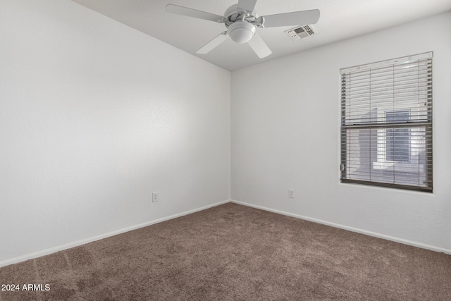 carpeted empty room with ceiling fan