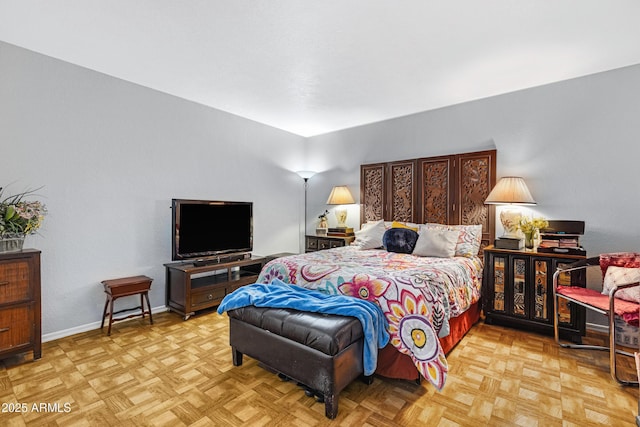 bedroom featuring baseboards