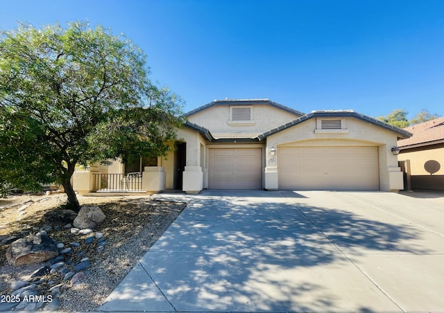 view of front of home with a garage