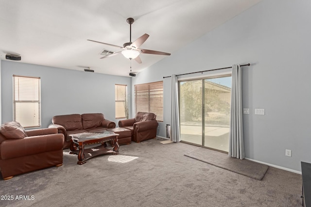 living room featuring ceiling fan, light colored carpet, and vaulted ceiling