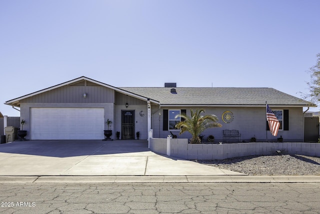 ranch-style house featuring a garage