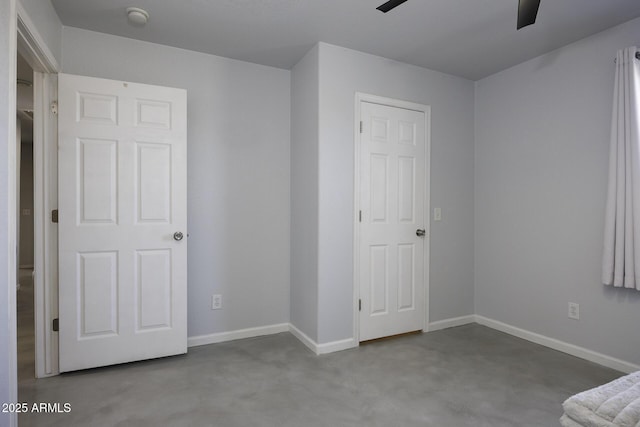 unfurnished bedroom featuring ceiling fan