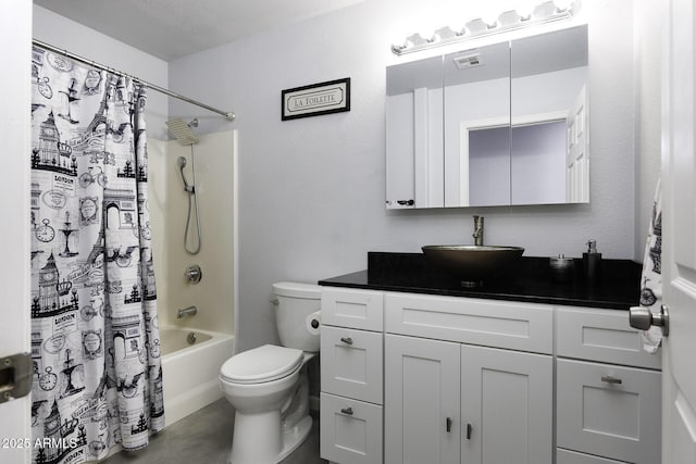 full bathroom with shower / bath combo, vanity, and toilet