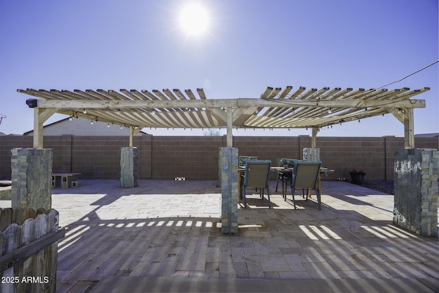 view of patio featuring a pergola