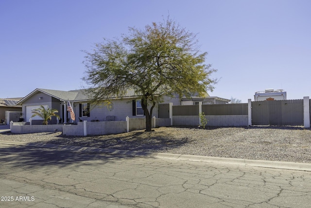 view of front of home featuring a garage