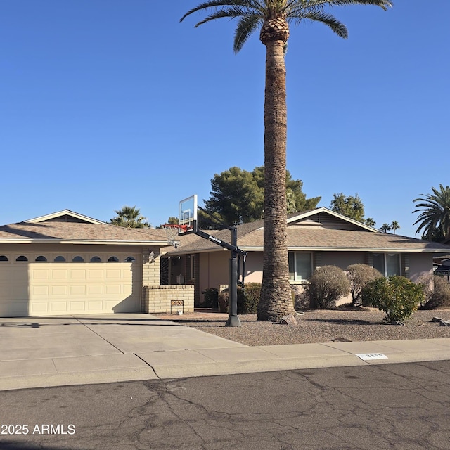 single story home featuring a garage