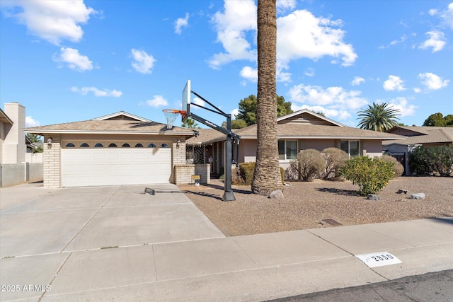 single story home featuring a garage