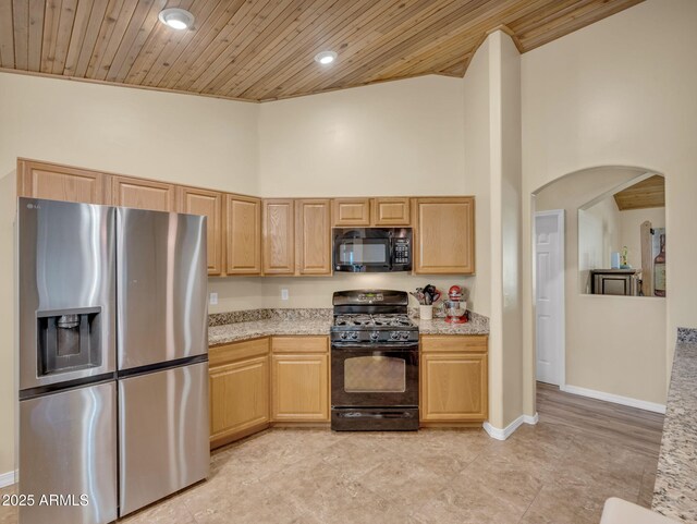490 E Twelve Oaks Dr, Flagstaff, AZ 86005 - kitchen with black appliances, high vaulted ceiling, arched walkways, wooden ceiling, and light brown cabinets