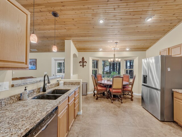 490 E Twelve Oaks Dr, Flagstaff, AZ 86005 - kitchen with stainless steel fridge with ice dispenser, light brown cabinetry, wood ceiling, dishwasher, and healthy amount of natural light