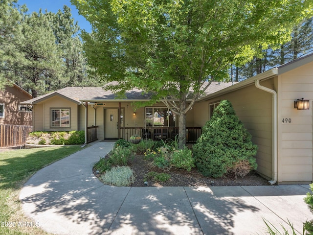 490 E Twelve Oaks Dr, Flagstaff, AZ 86005 - single story home featuring a porch