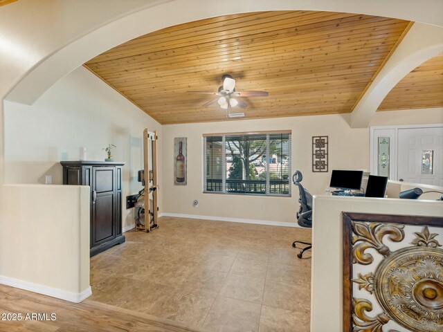 490 E Twelve Oaks Dr, Flagstaff, AZ 86005 - office space featuring wooden ceiling, arched walkways, lofted ceiling, ceiling fan, and light tile patterned floors