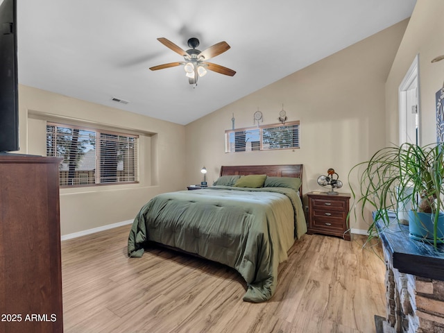490 E Twelve Oaks Dr, Flagstaff, AZ 86005 - bedroom featuring lofted ceiling, light wood-style floors, multiple windows, and ceiling fan