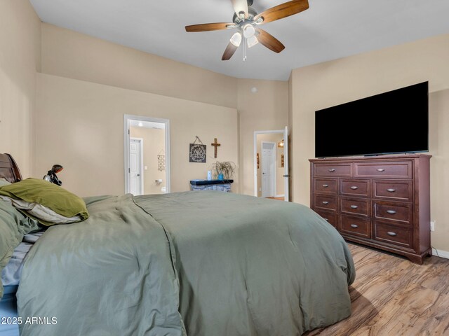 490 E Twelve Oaks Dr, Flagstaff, AZ 86005 - bedroom with light wood finished floors, ensuite bath, and ceiling fan