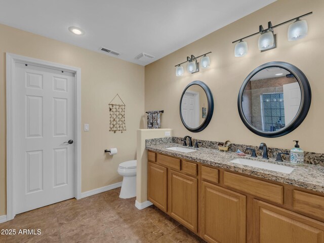 490 E Twelve Oaks Dr, Flagstaff, AZ 86005 - bathroom featuring double vanity and tiled shower