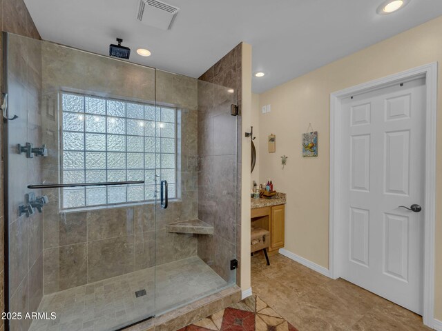490 E Twelve Oaks Dr, Flagstaff, AZ 86005 - bathroom featuring a stall shower, vanity, tile patterned flooring, and recessed lighting