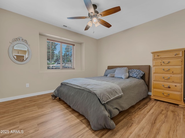 490 E Twelve Oaks Dr, Flagstaff, AZ 86005 - bedroom with light wood-type flooring and ceiling fan