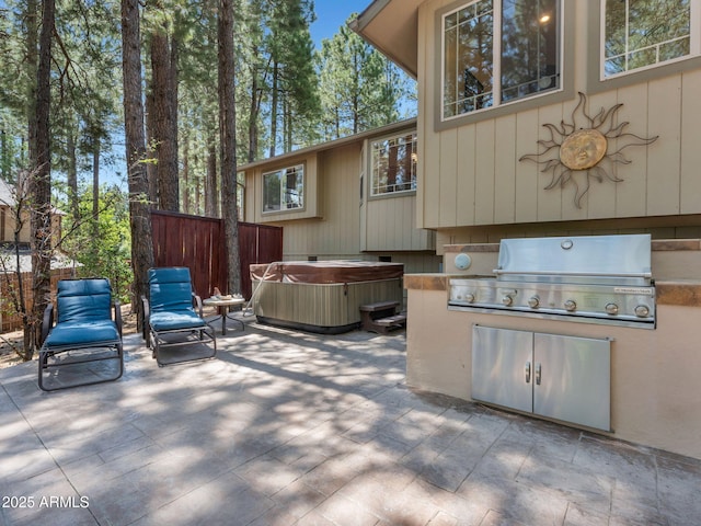 490 E Twelve Oaks Dr, Flagstaff, AZ 86005 - view of patio / terrace featuring a hot tub and grilling area