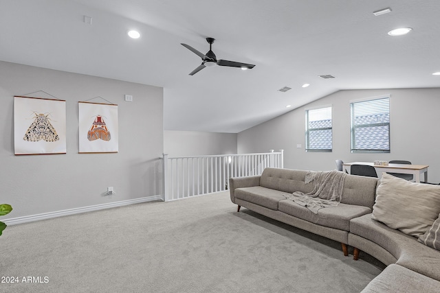 living room with ceiling fan, light carpet, and vaulted ceiling