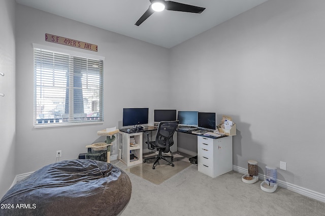 office with ceiling fan and light colored carpet