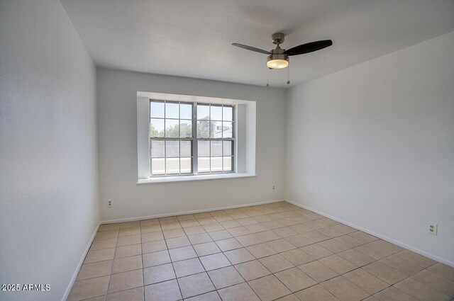 722 W Topeka Dr, Phoenix, AZ 85027 - spare room with ceiling fan, light tile patterned flooring, and baseboards