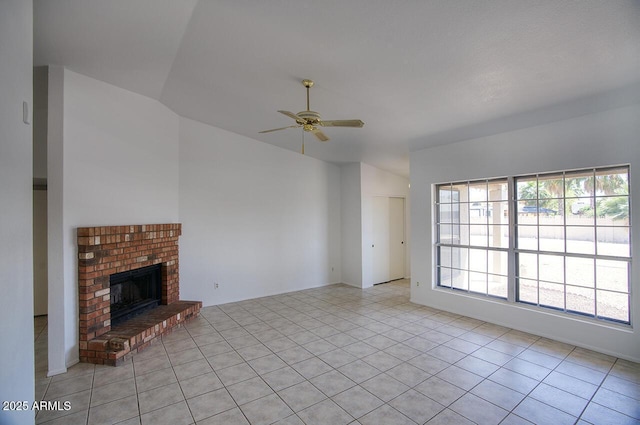 722 W Topeka Dr, Phoenix, AZ 85027 - unfurnished living room featuring a ceiling fan, light tile patterned floors, vaulted ceiling, and a fireplace