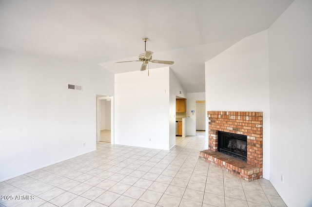 722 W Topeka Dr, Phoenix, AZ 85027 - unfurnished living room featuring a ceiling fan, light tile patterned flooring, a brick fireplace, high vaulted ceiling, and baseboards
