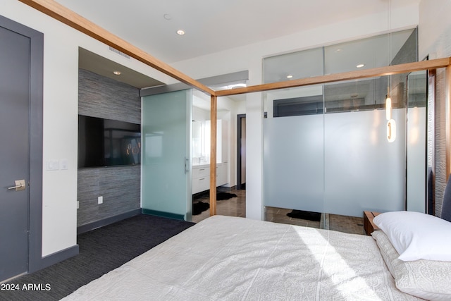 bedroom featuring recessed lighting and baseboards