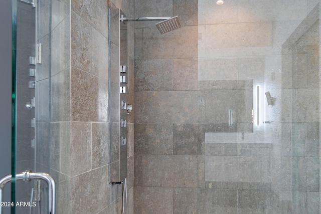bathroom featuring a stall shower
