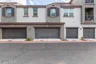 townhome / multi-family property featuring a garage