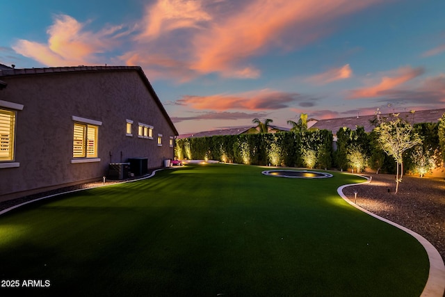 31517 N 41st St, Cave Creek, AZ 85331 - view of green lawn featuring central air condition unit