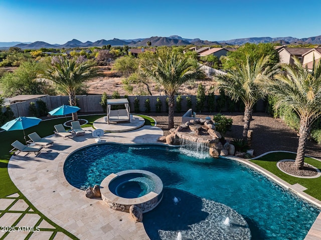 31517 N 41st St, Cave Creek, AZ 85331 - view of pool featuring a mountain view, a patio area, a fenced backyard, and a pool with connected hot tub