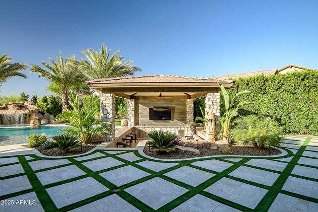31517 N 41st St, Cave Creek, AZ 85331 - view of patio with a fireplace, a gazebo, and an outdoor pool