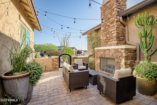 31517 N 41st St, Cave Creek, AZ 85331 - view of patio / terrace featuring an outdoor stone fireplace