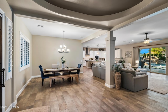 31517 N 41st St, Cave Creek, AZ 85331 - dining room with light wood-style flooring, a chandelier, baseboards, a ceiling fan, and recessed lighting