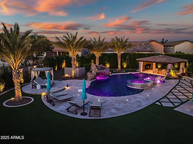 31517 N 41st St, Cave Creek, AZ 85331 - pool at dusk with a gazebo, a patio, a pool with connected hot tub, and a yard