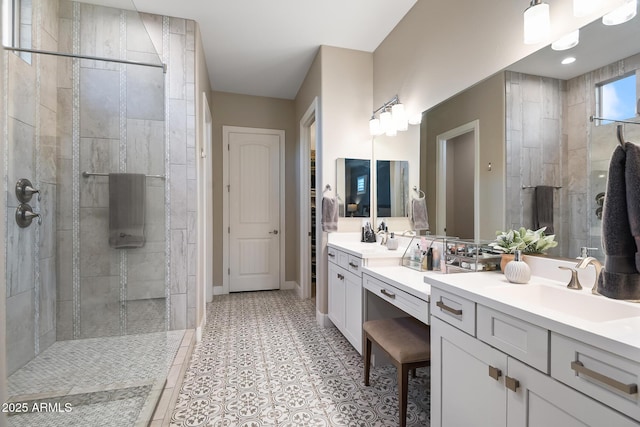31517 N 41st St, Cave Creek, AZ 85331 - full bathroom featuring a tile shower, double vanity, and baseboards