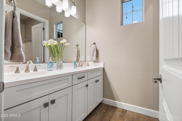 31517 N 41st St, Cave Creek, AZ 85331 - bathroom with baseboards, wood finished floors, and double vanity