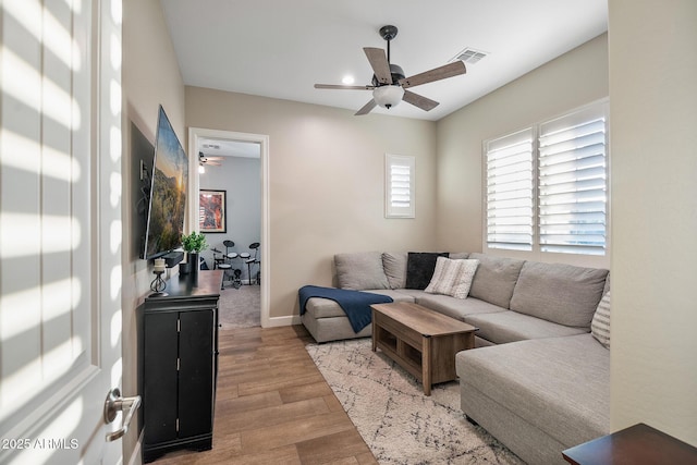 31517 N 41st St, Cave Creek, AZ 85331 - living area featuring ceiling fan, wood finished floors, and baseboards